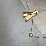 Minimalist brass floor lamp from the mid-century by Dieter Schulz for Wohnbedarf Ag, 1950s.