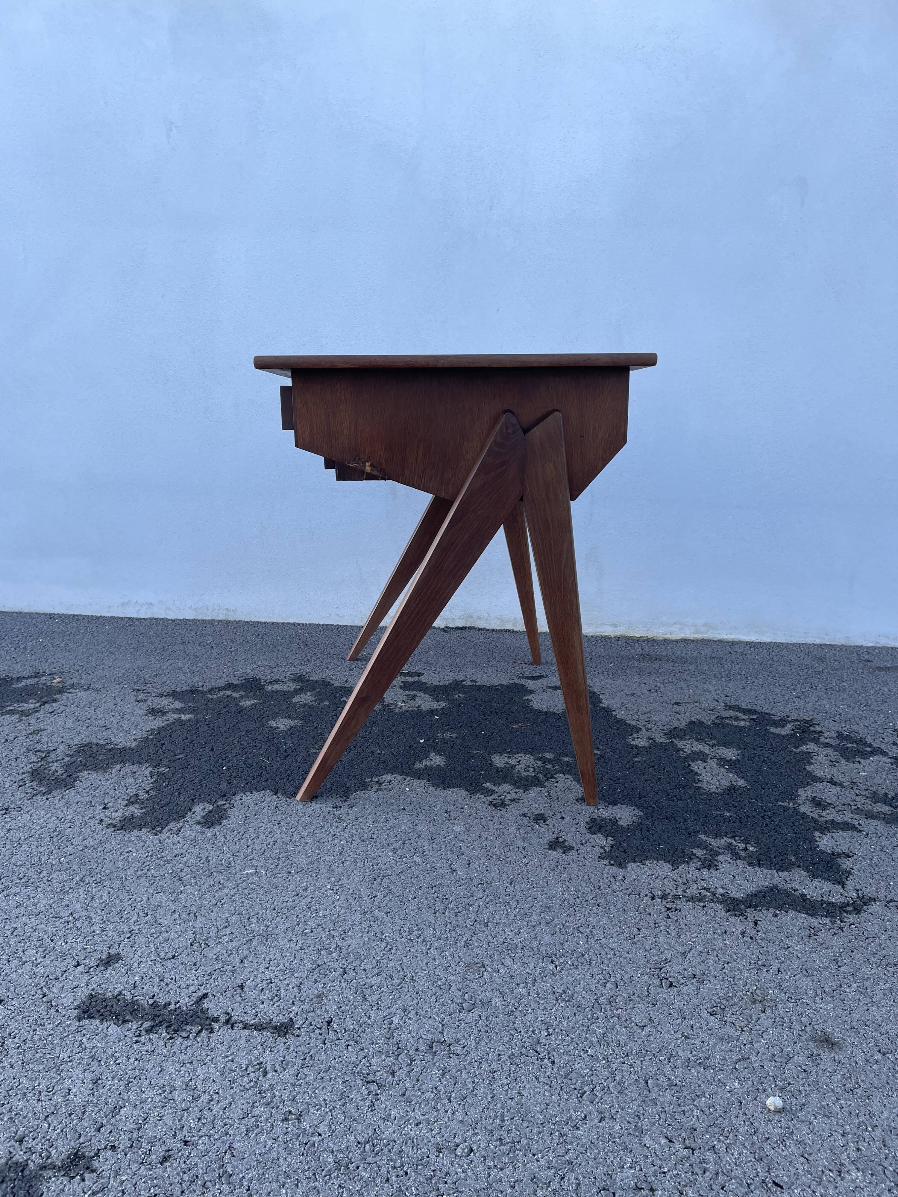 Modernist wooden desk with compass feet 1950