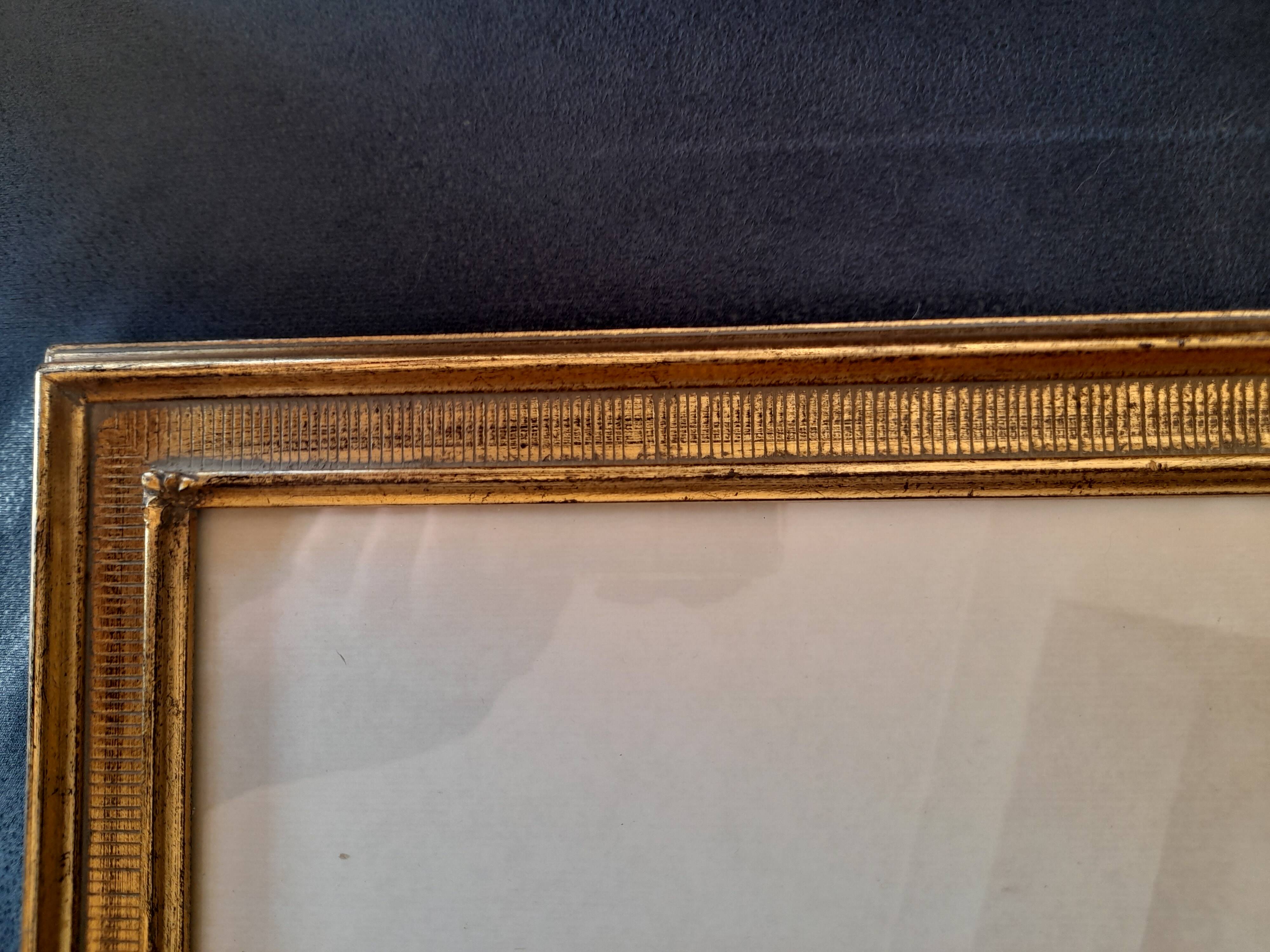 Antique frame with striated gilding