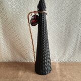 Glass bottle covered with black scoubidou with twisted golden handle - vintage