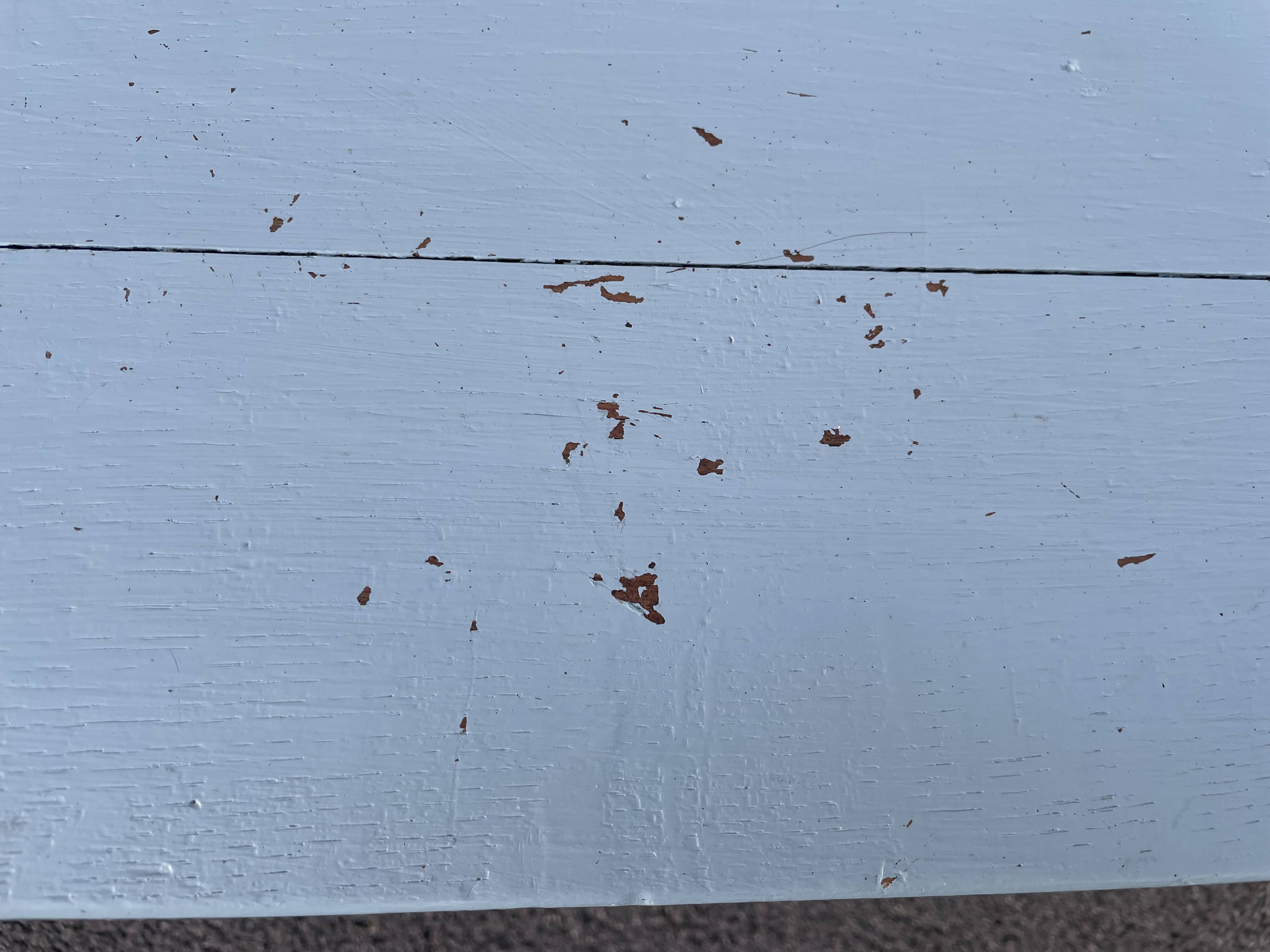 Blue painted wooden bench