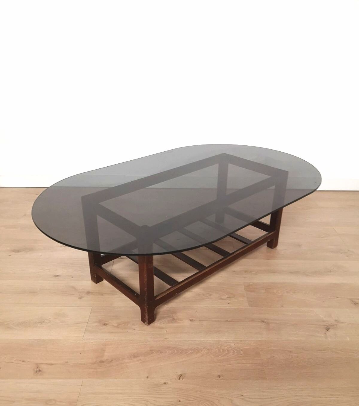Scandinavian oval smoked glass coffee table