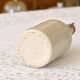 Antique enamelled stoneware beer bottle signed MKM