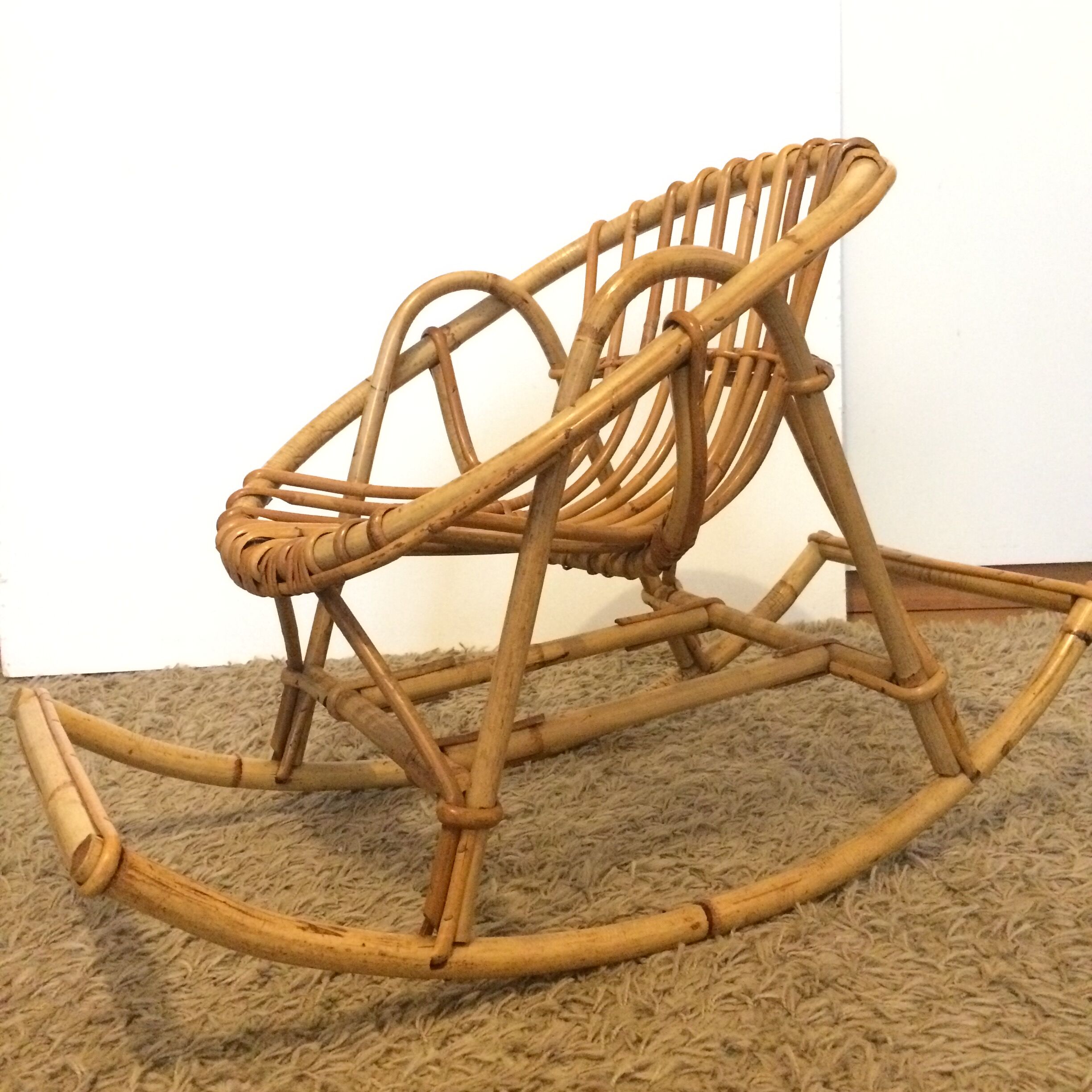 Vintage rattan children's rocking chair