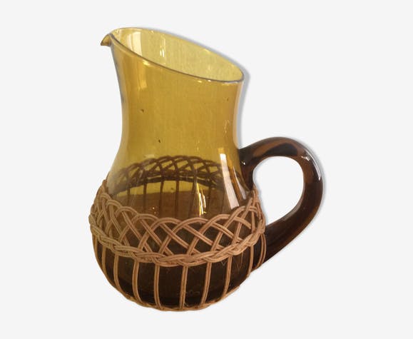 Pitcher dressed in wicker