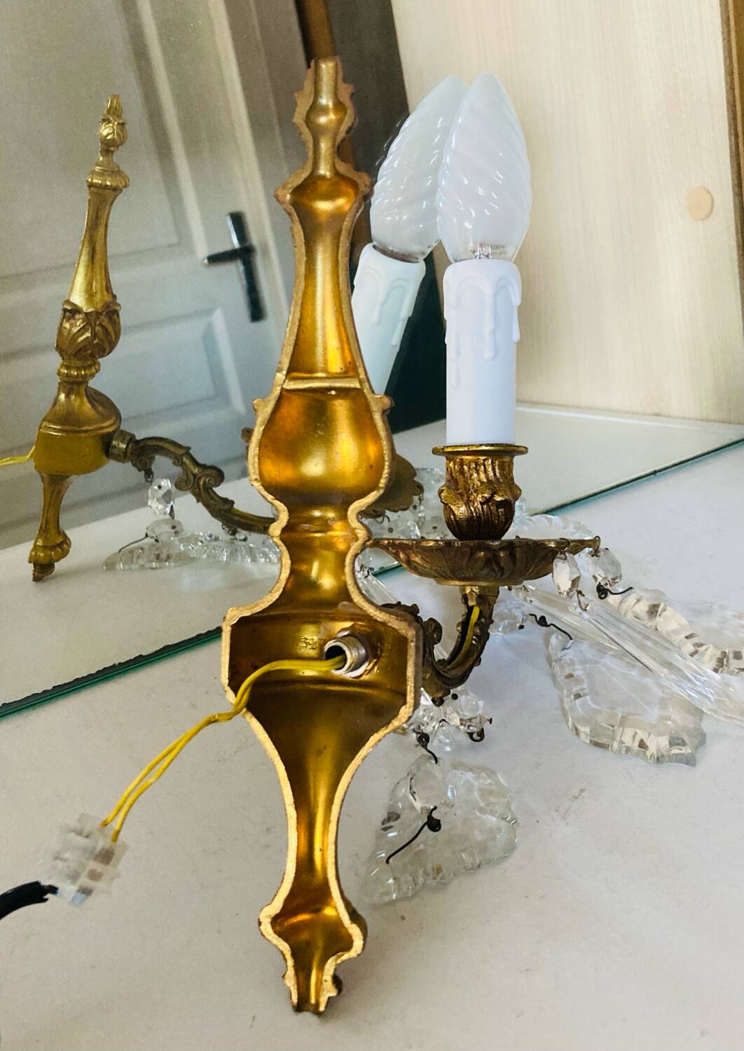 St Louis XV wall lights in gilded bronze with pendants from the mid-20th century.