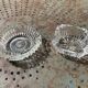 Set of two elegant vintage transparent glass and crystal ashtrays