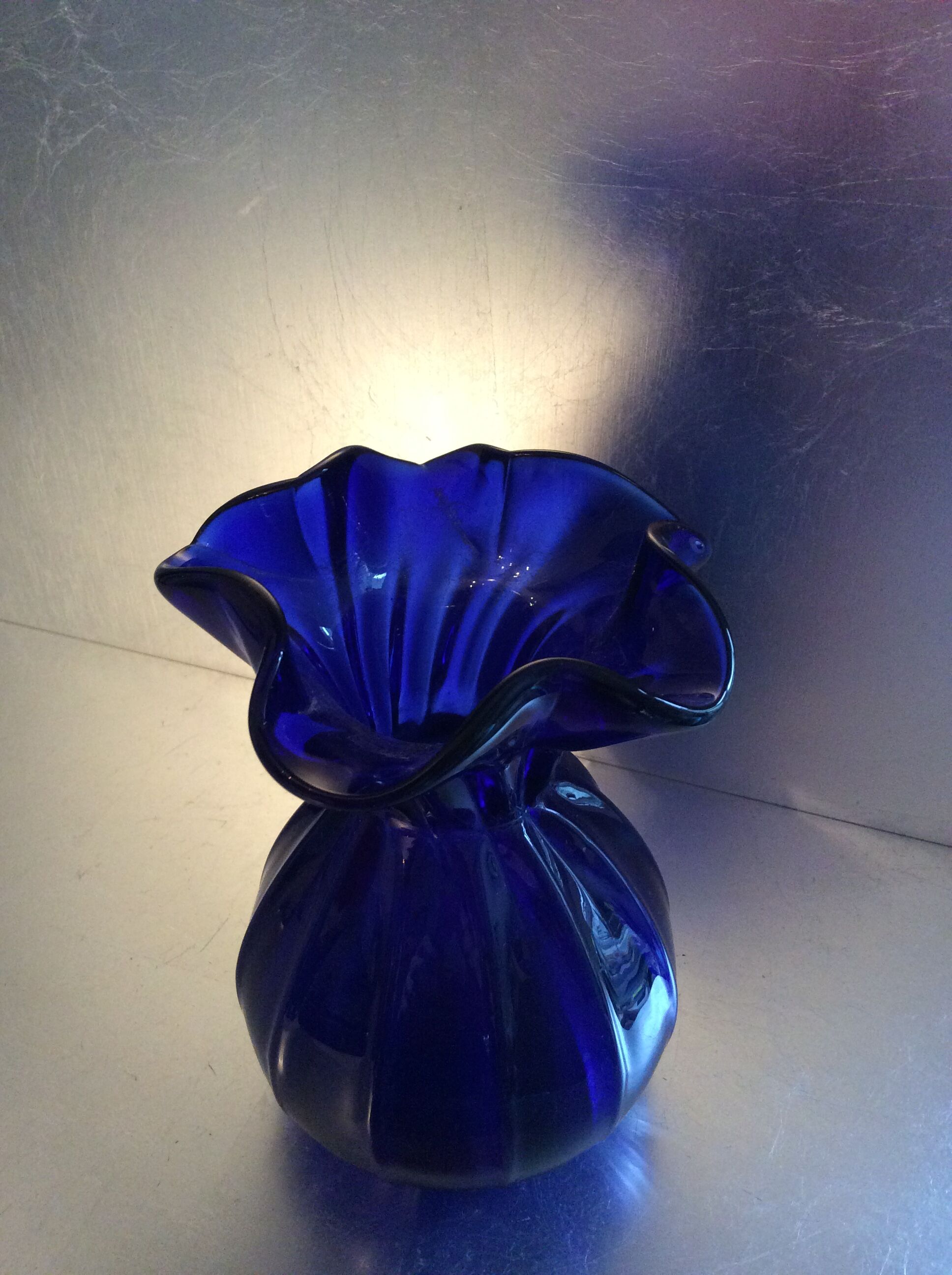 Vintage vase in blue glass paste