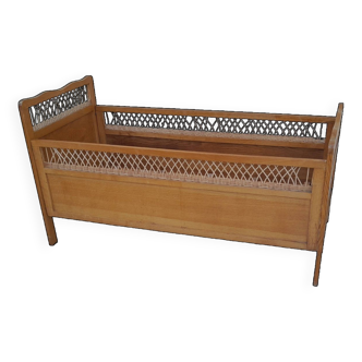 Vintage baby bed in wood and rattan from the 60s for children