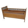 Vintage baby bed in wood and rattan from the 60s for children