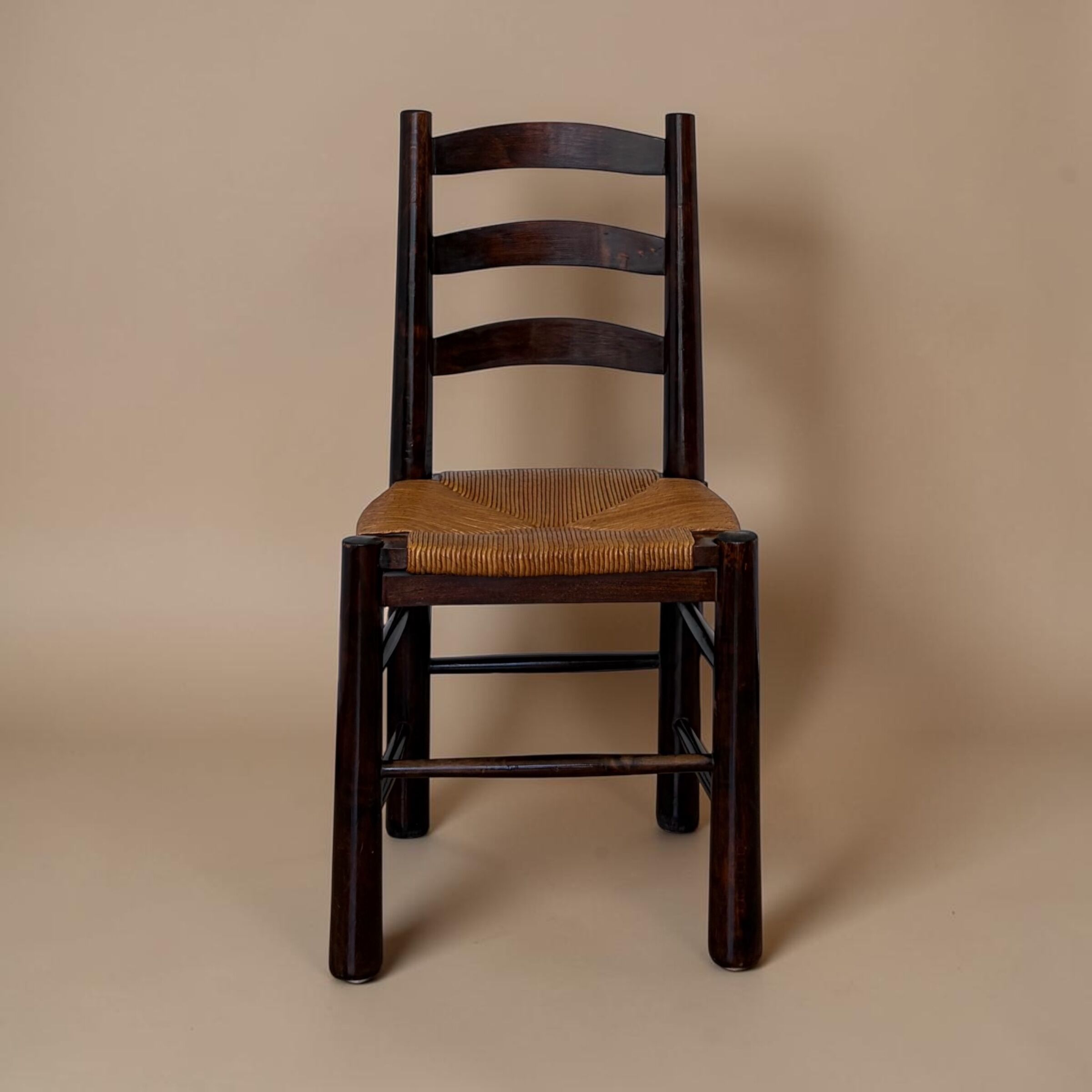 Rustic chairs attributed to Georges Robert.