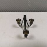 Small candle holder in tarnished silver, with place for three small candles