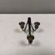 Small candle holder in tarnished silver, with place for three small candles