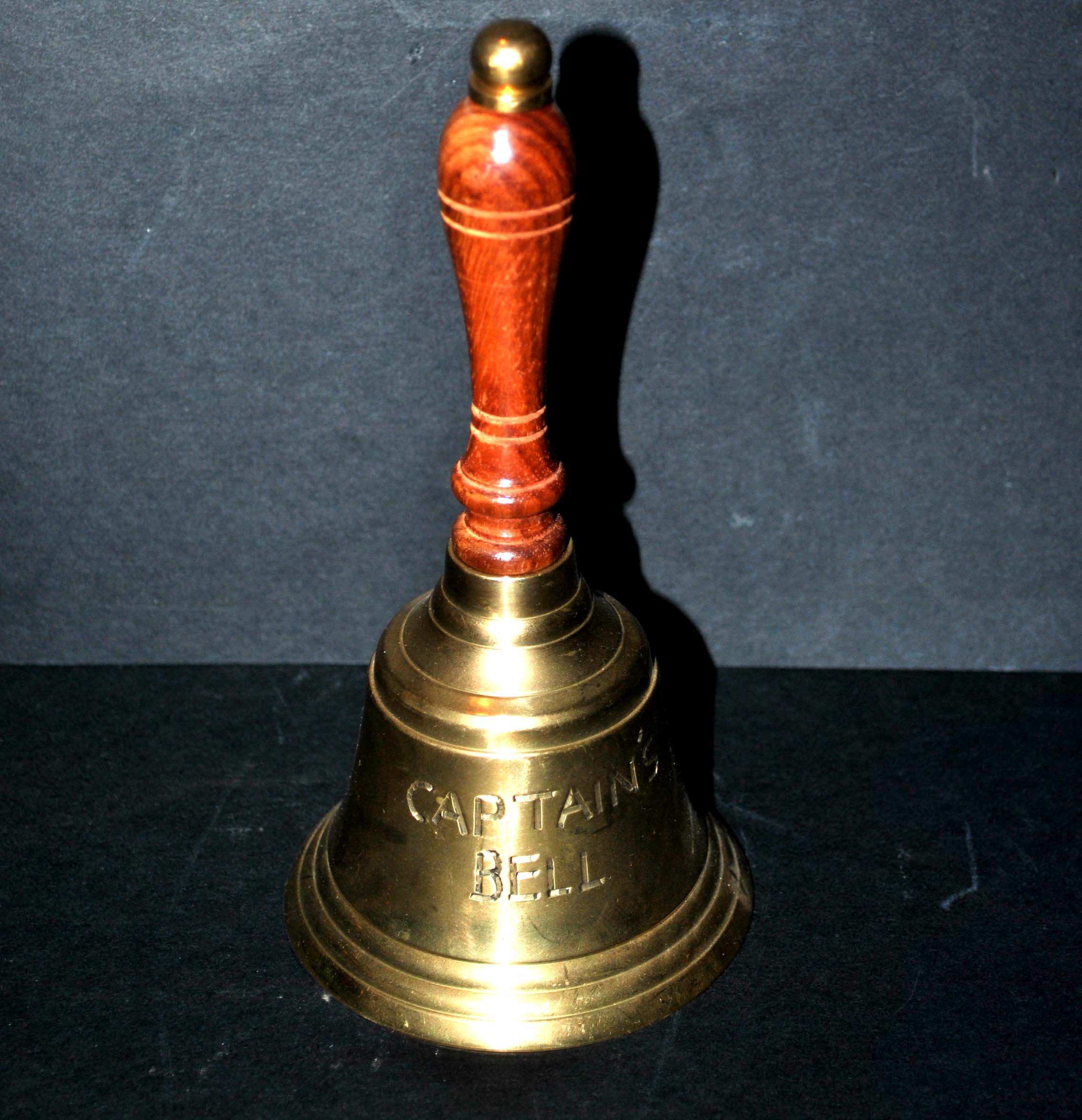 Table bell captain's bell in gilded brass and bell wood