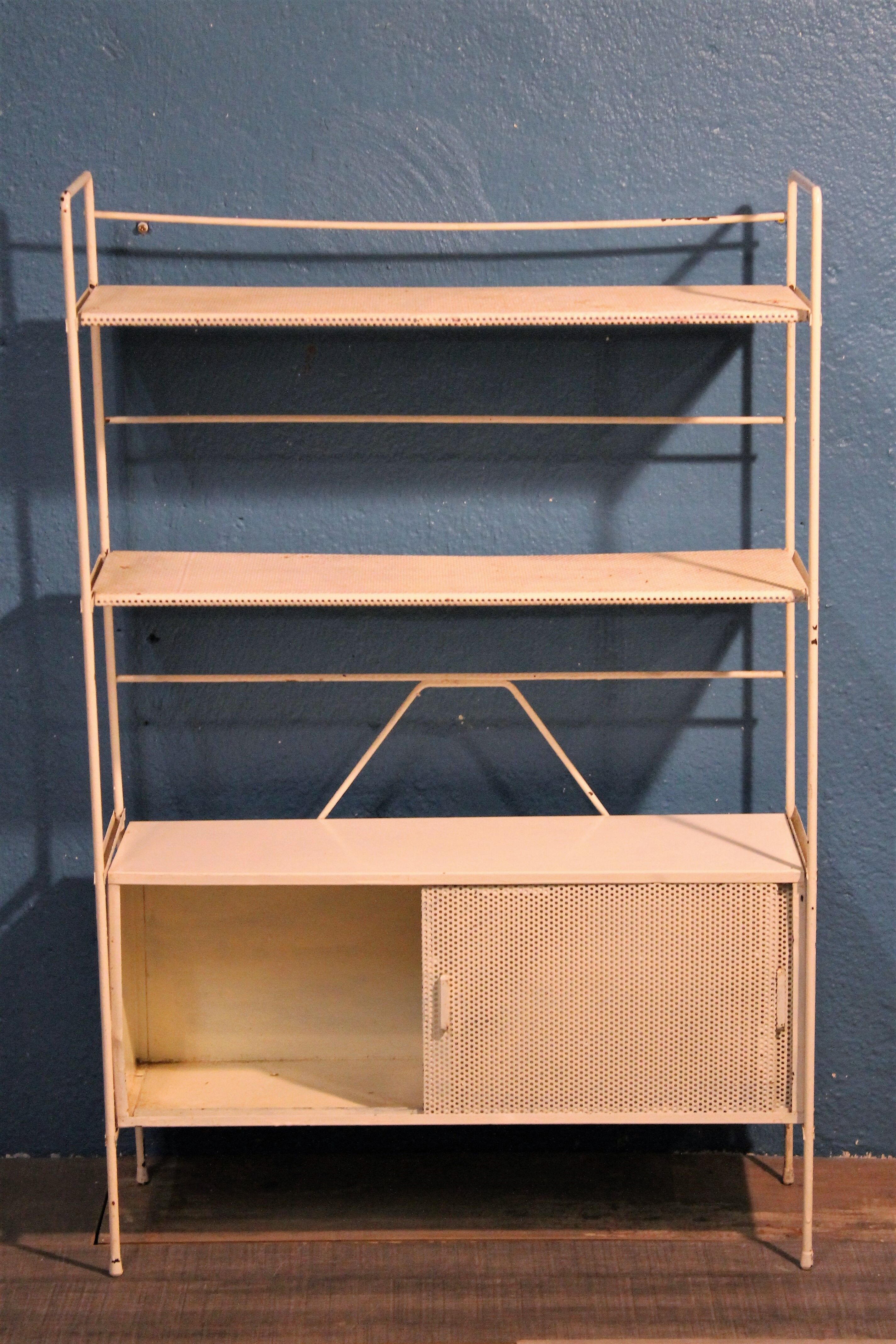 Perforated metal stand 1950