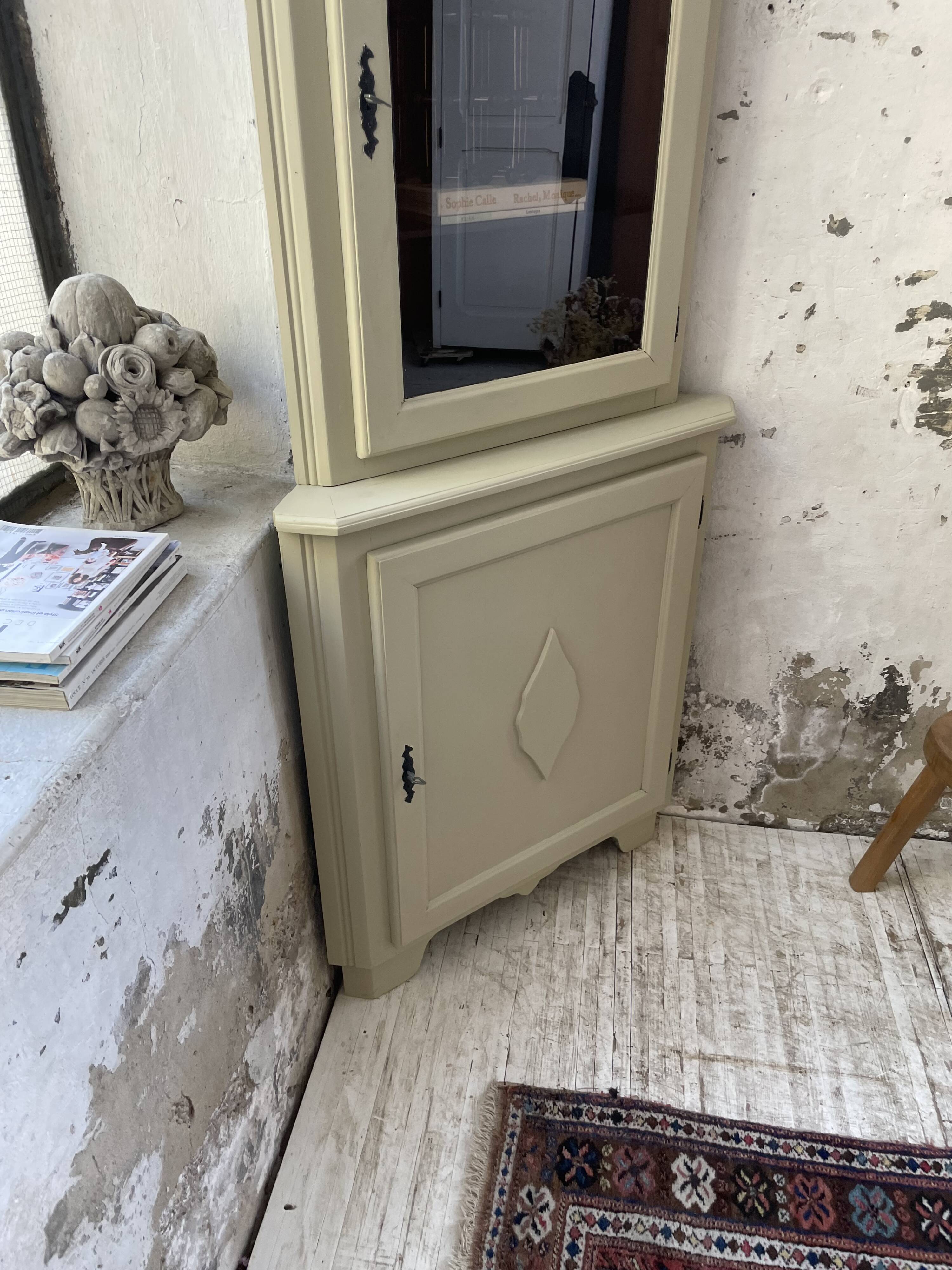 Corner display cabinet from the 1950s