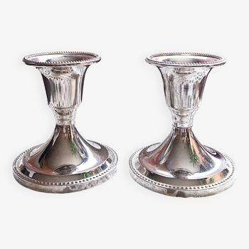 Pair of silver metal table candlesticks