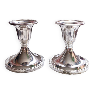 Pair of silver metal table candlesticks