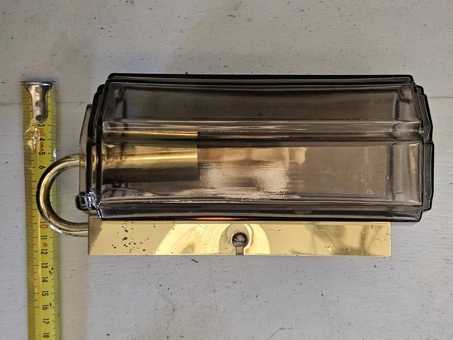 Pair of glass and brass wall lights, 1960s.