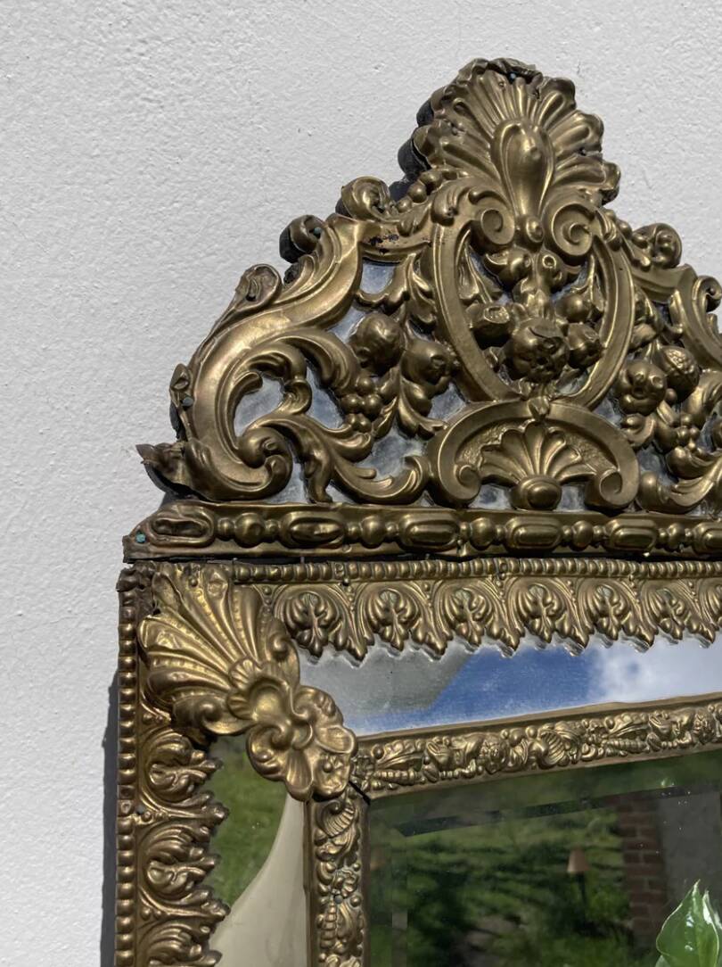 Golden mirror with 19th century embossed brass beads