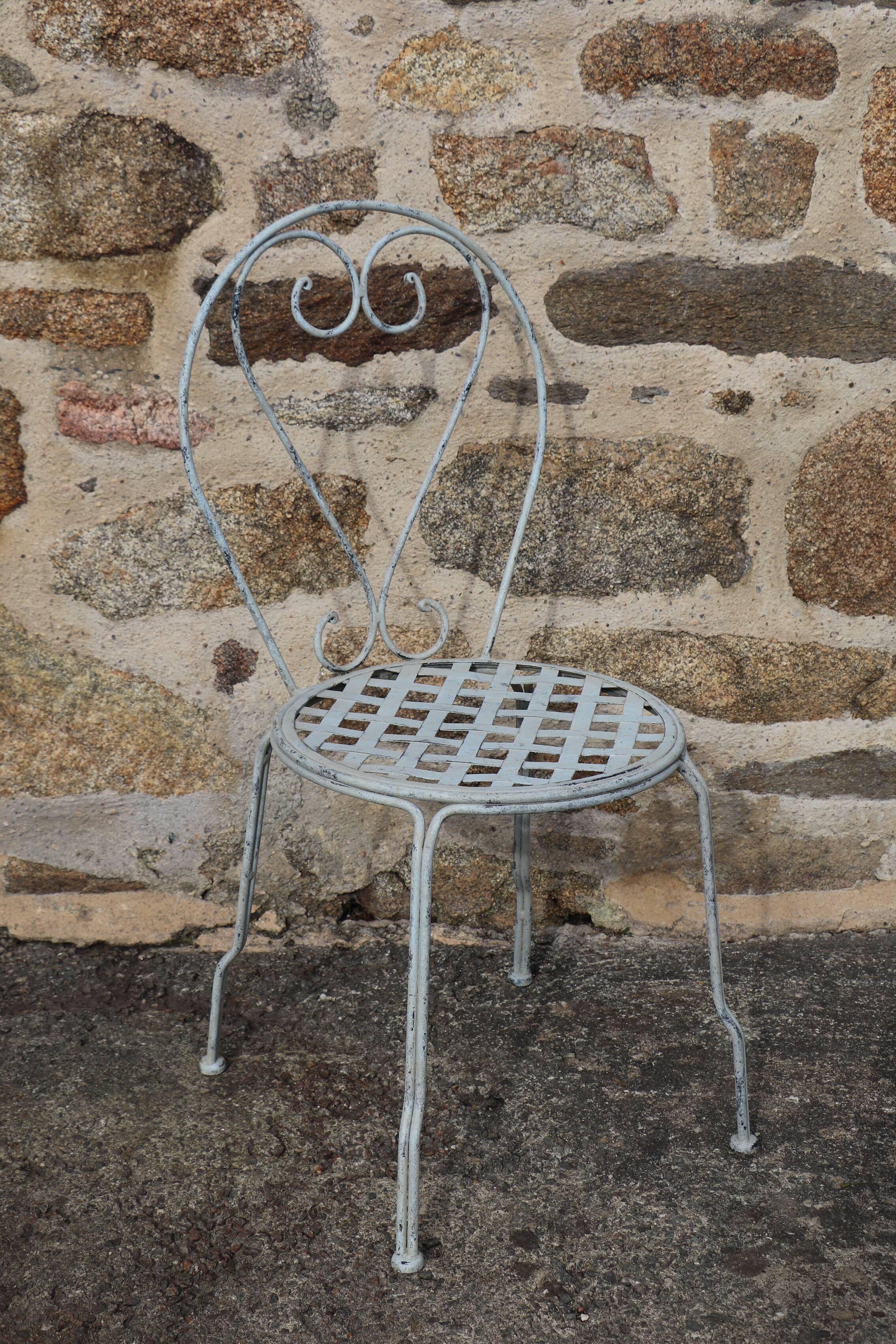 Series of 6 wrought iron garden chairs