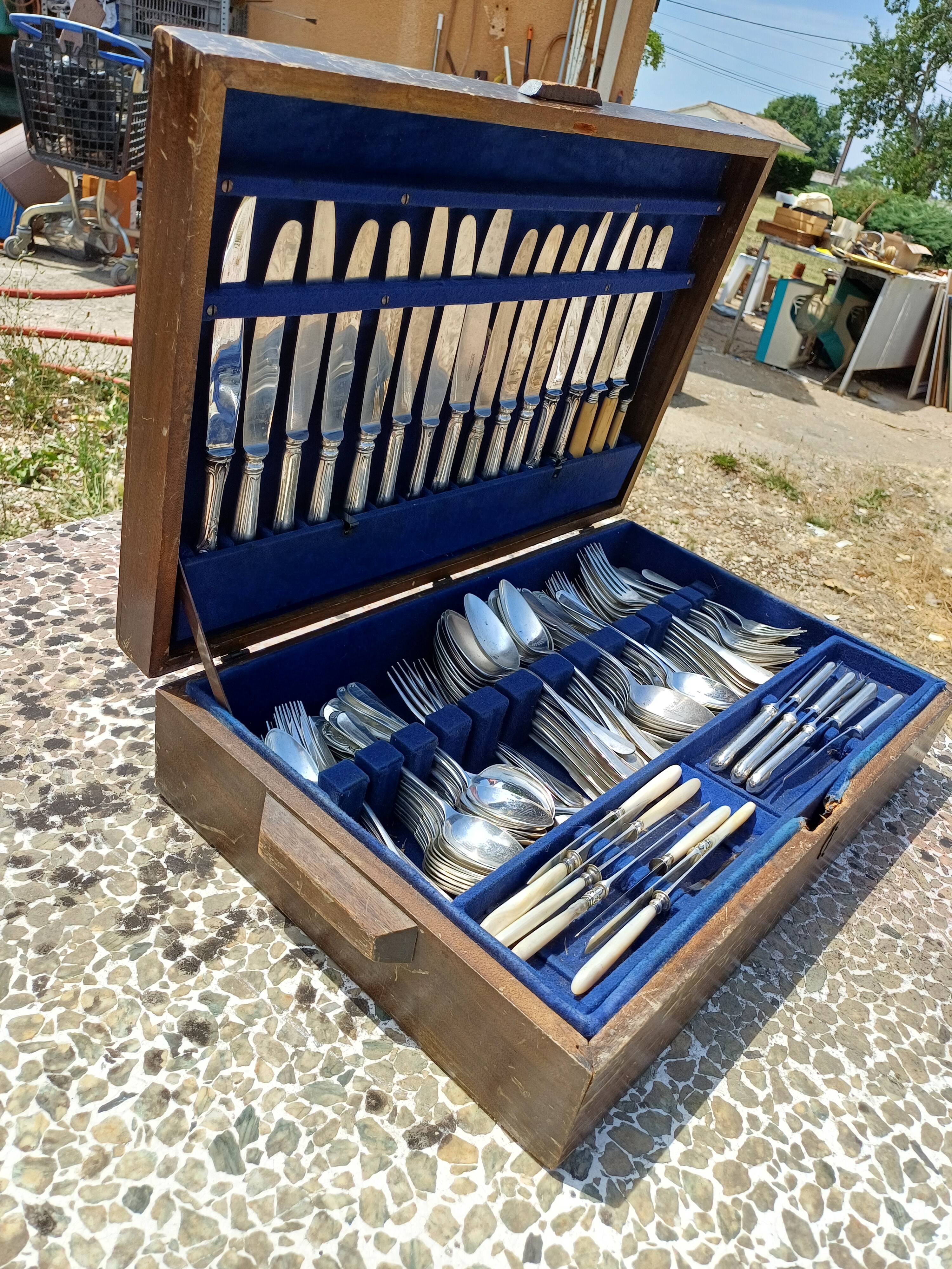 Set of silver metal cutlery from maken's + centrepiece + basket