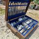 Set of silver metal cutlery from maken's + centrepiece + basket