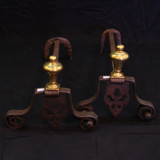 Pair of andirons in gilded bronze and iron of the 19th