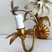 Vintage Hollywood Regency gold metal leaf wall sconce.