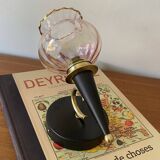 Pair of torch wall lights with iridescent pink glass shades and gold trim.