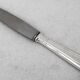 12 dessert, cheese, and hors d'oeuvre knives Grand Prix, Art Deco in silver-plated metal.