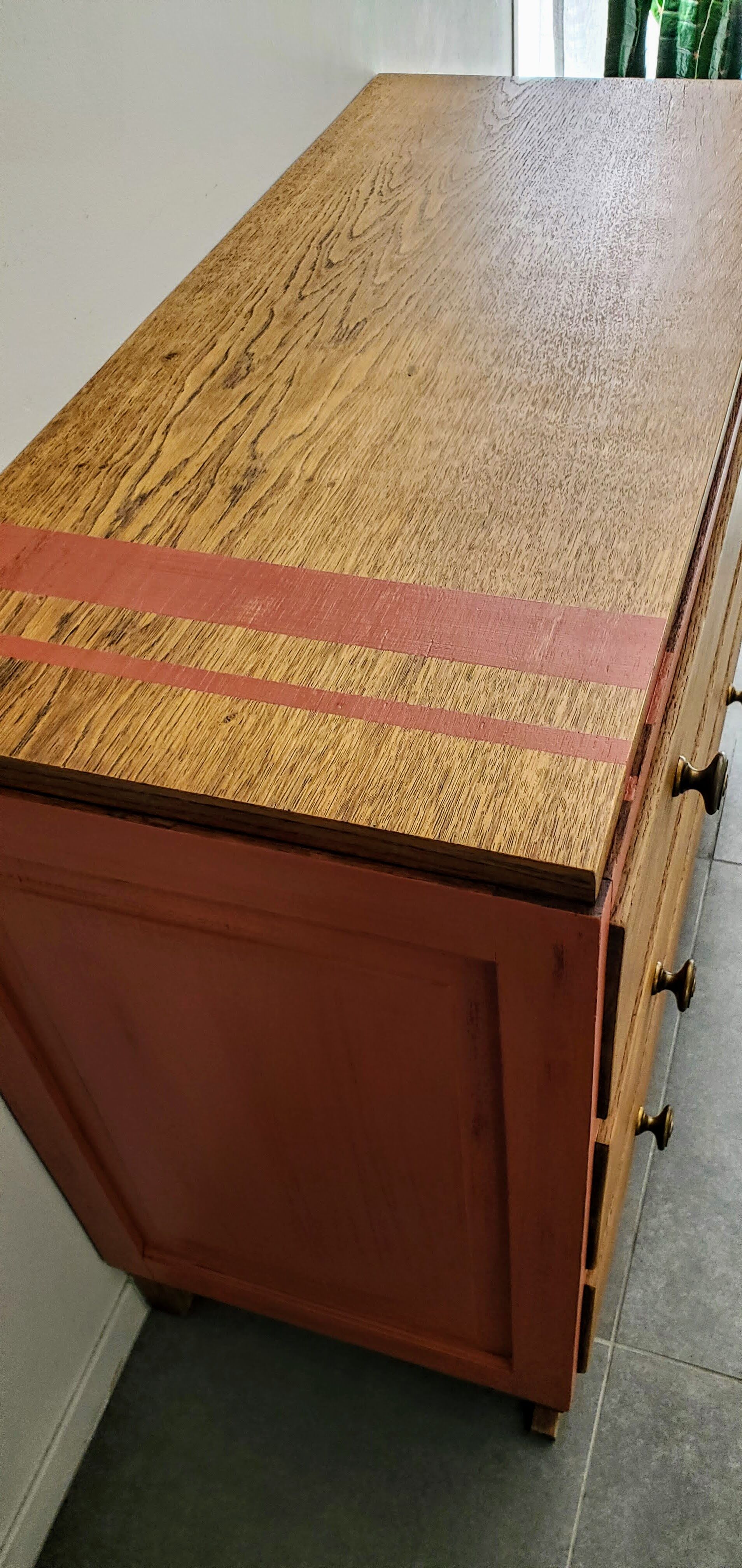 Terracotta patina oak chest of drawers