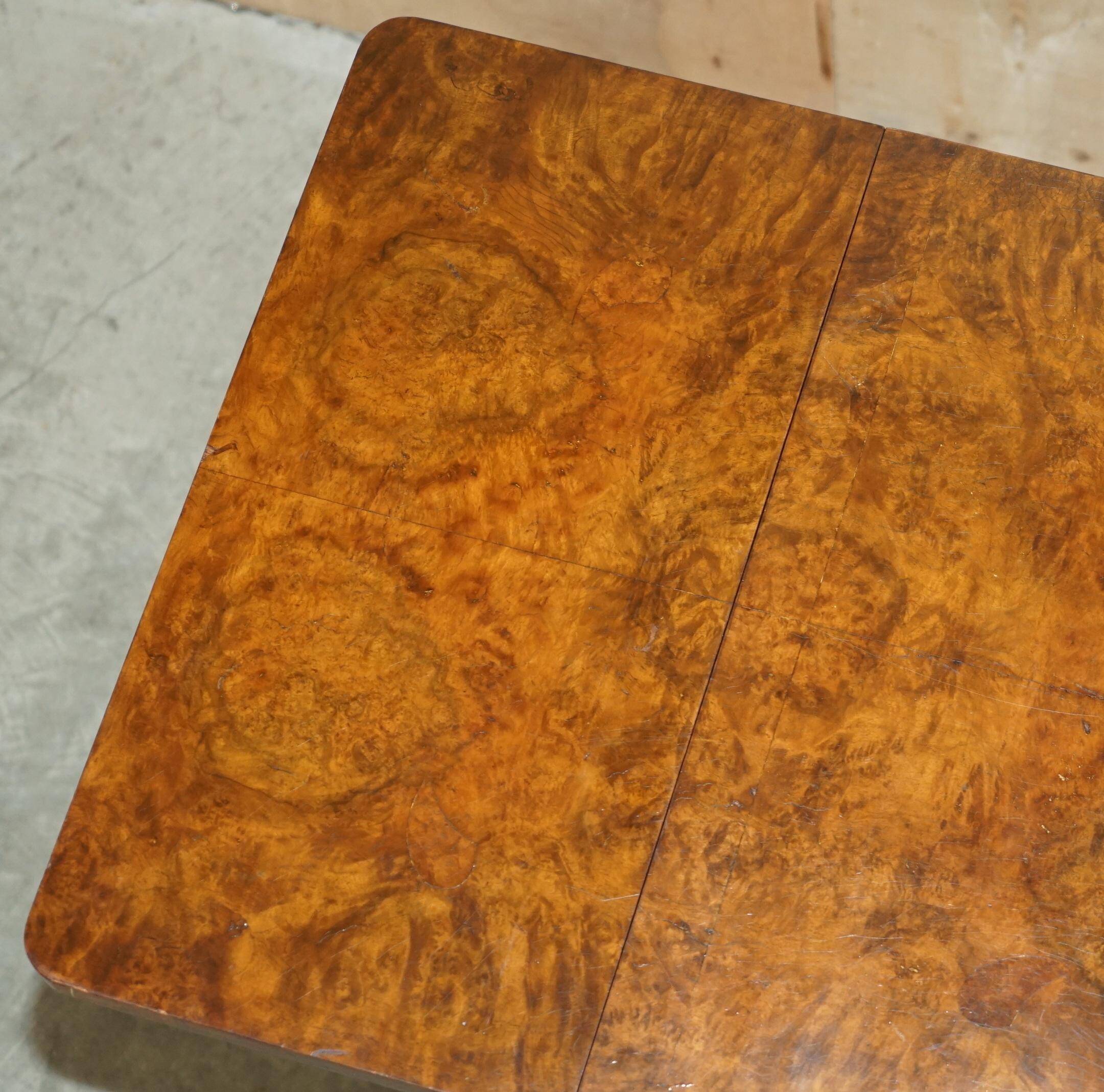 Antique extendable coffee table circa 1880 in solid walnut.