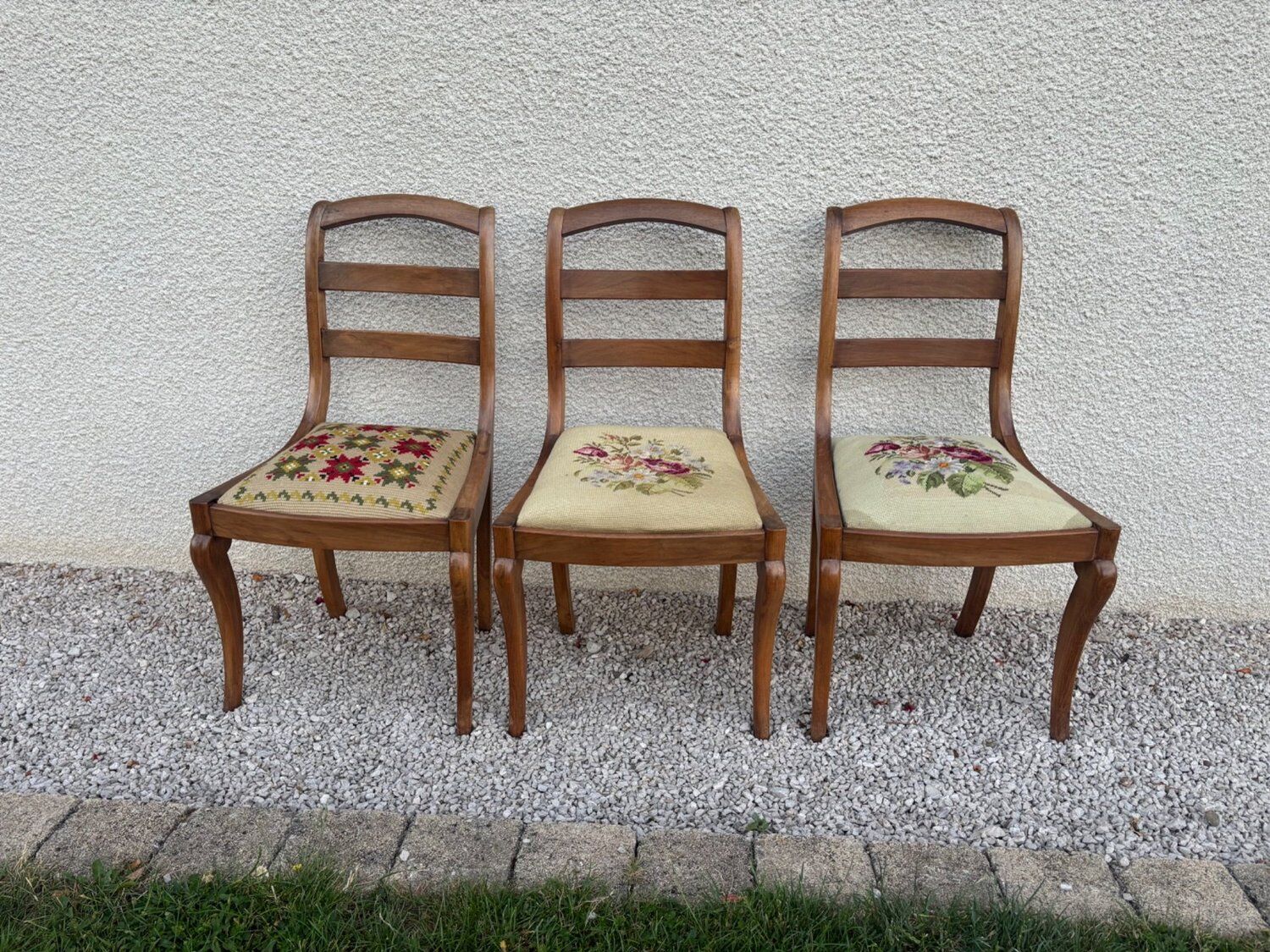 Set of three Louis XV chairs in solid walnut with petit point upholstery from the 19th century.