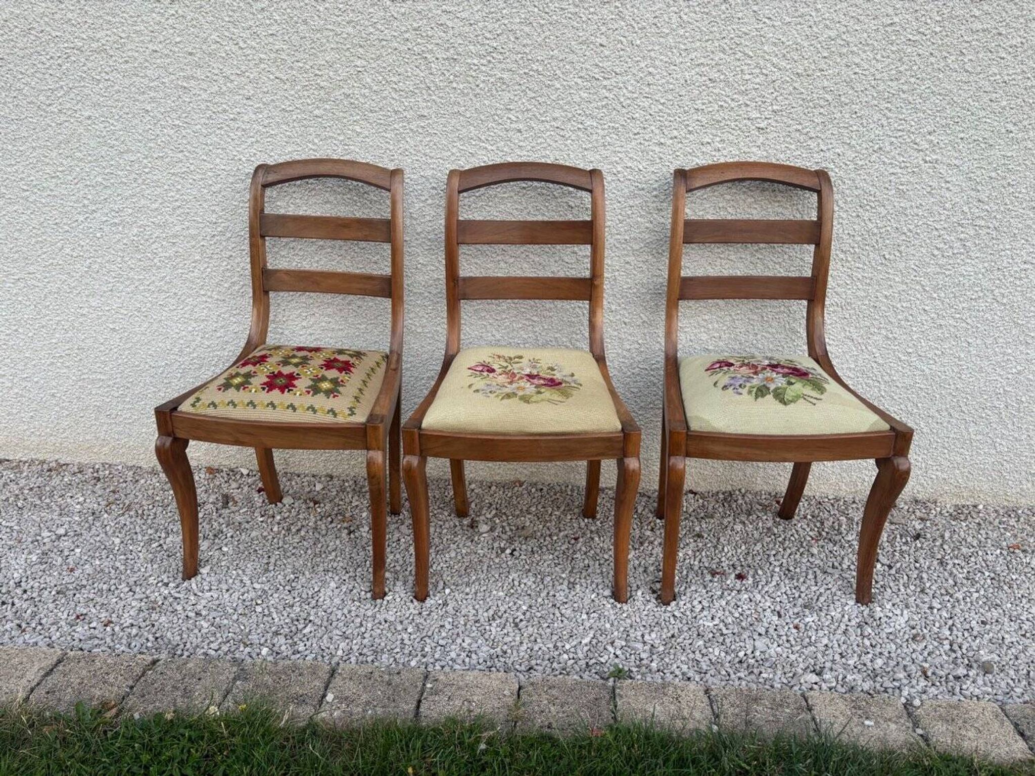 Set of three Louis XV chairs in solid walnut with petit point upholstery from the 19th century.