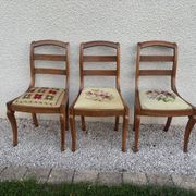 Set of three Louis XV chairs in solid walnut with petit point upholstery from the 19th century.