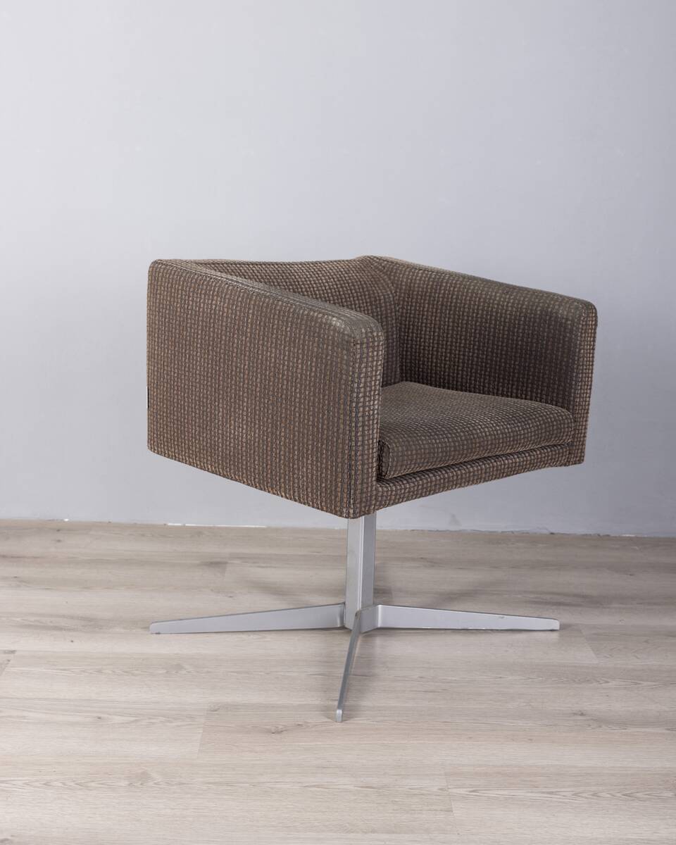 "Cubica" metal and fabric swivel armchair designed by Verzelloni
