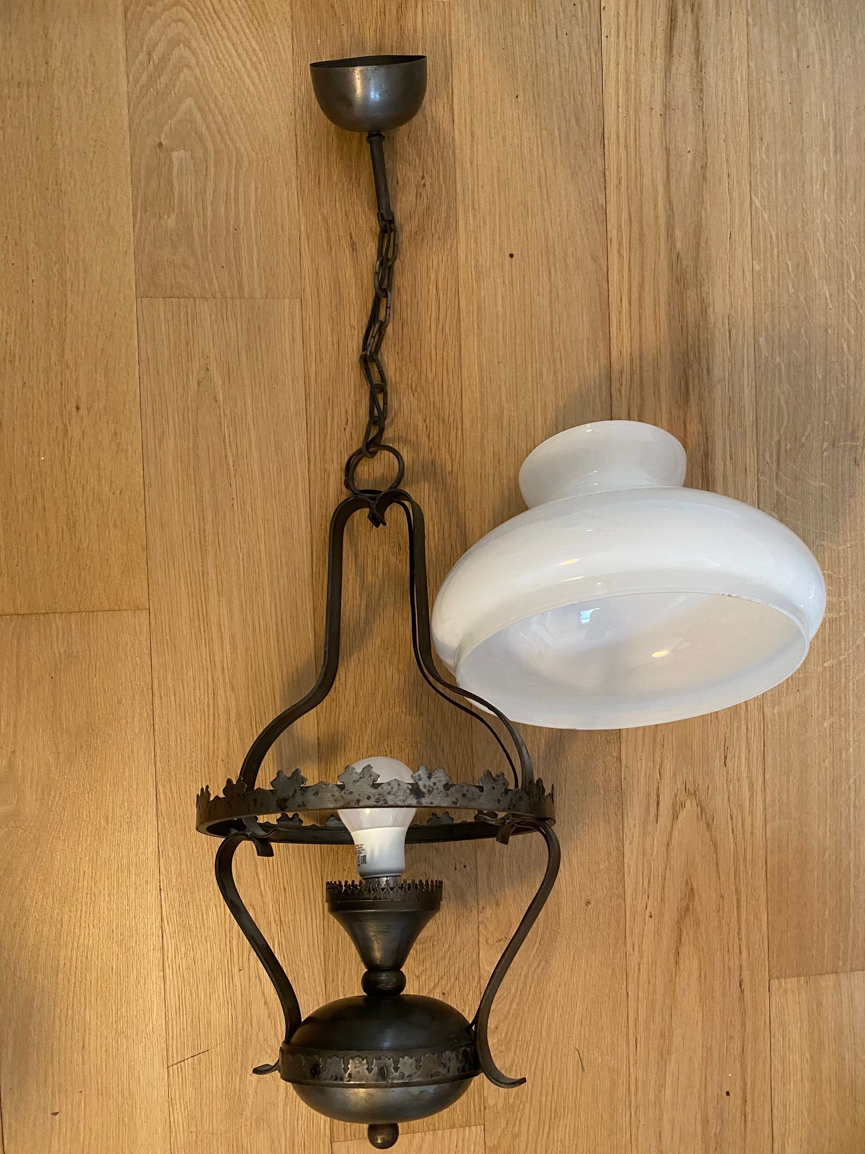 Metal chandelier and opaline glass gloss