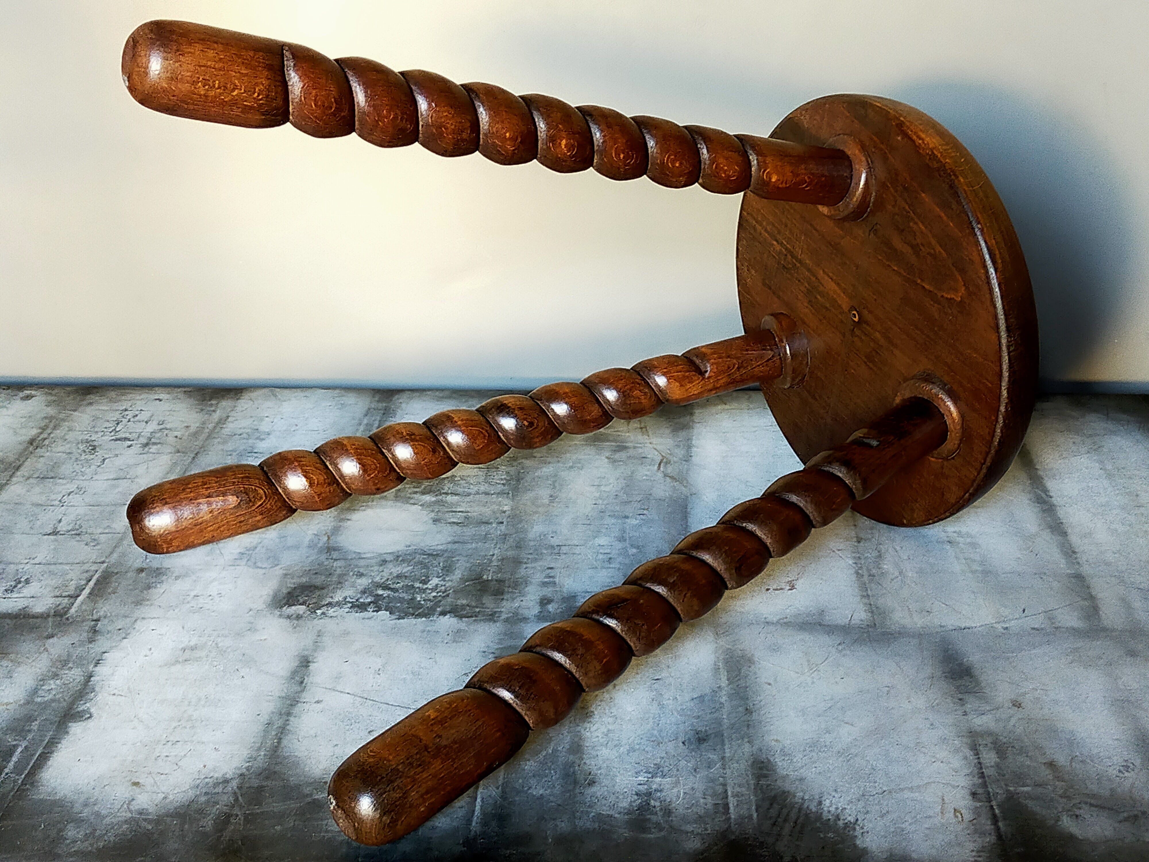 Vintage tripod stool in solid wooden twisted feet