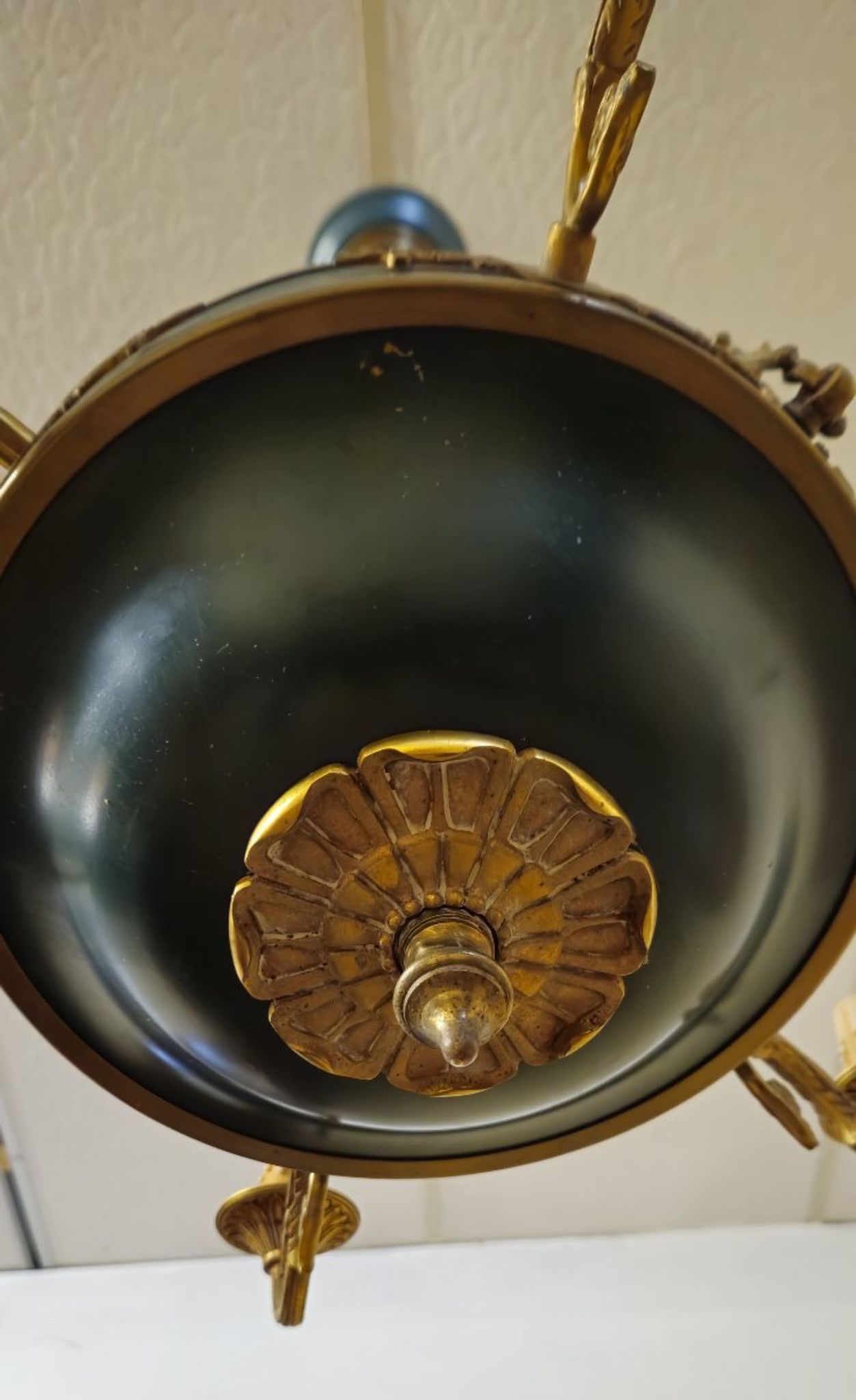 Antique gilded bronze chandelier with six arms, in Empire style.