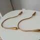 Pairs of vintage hooks in solid golden brass