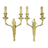Pair of large wall sconces with flowers in the Louis XVI style from the 19th century - gilded bronze.