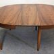 Scandinavian extendable round table in rosewood, 60s-70s