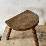 Wooden tripod farm stool