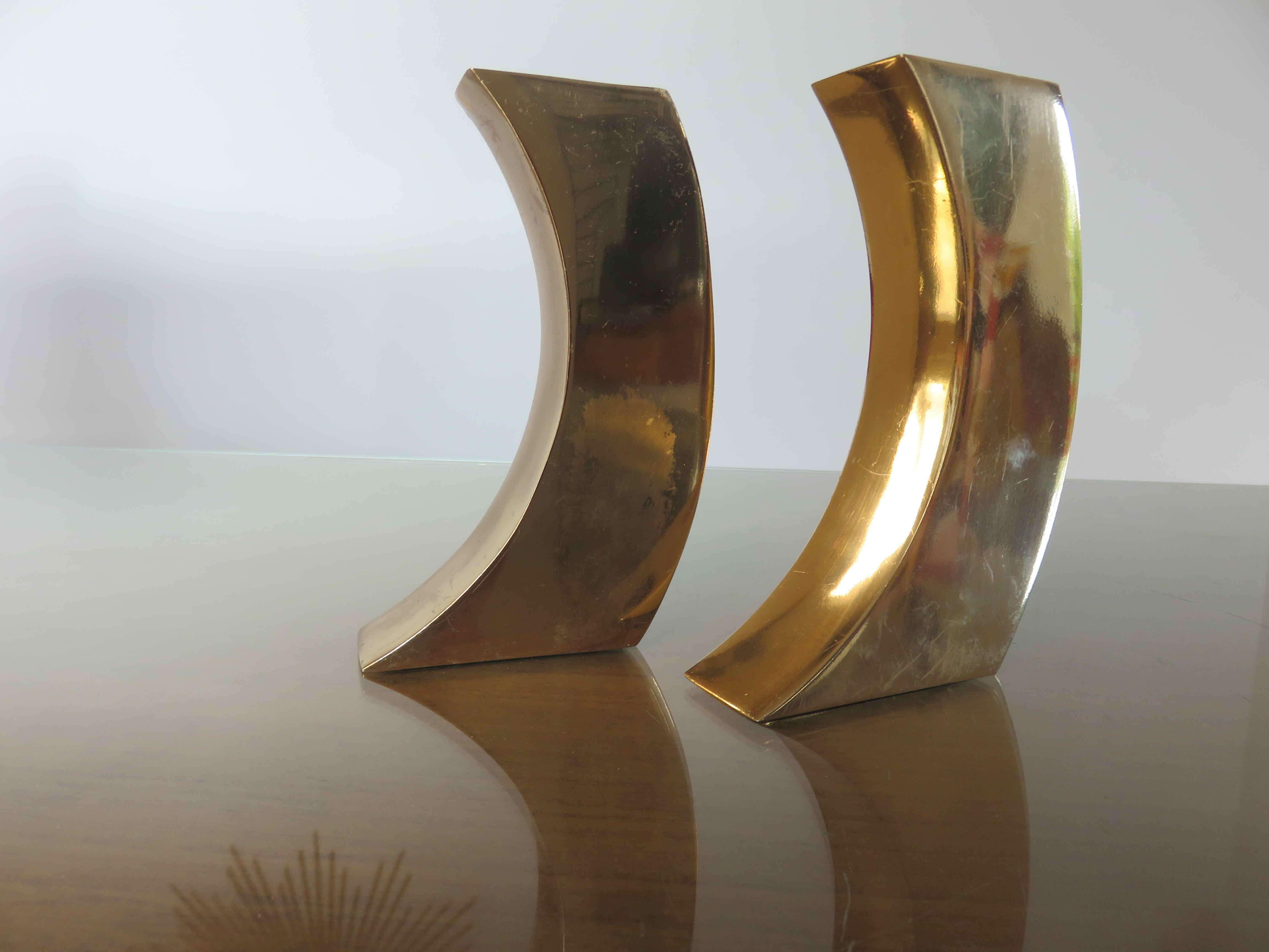Pair of candle holders in golden brass, 70s