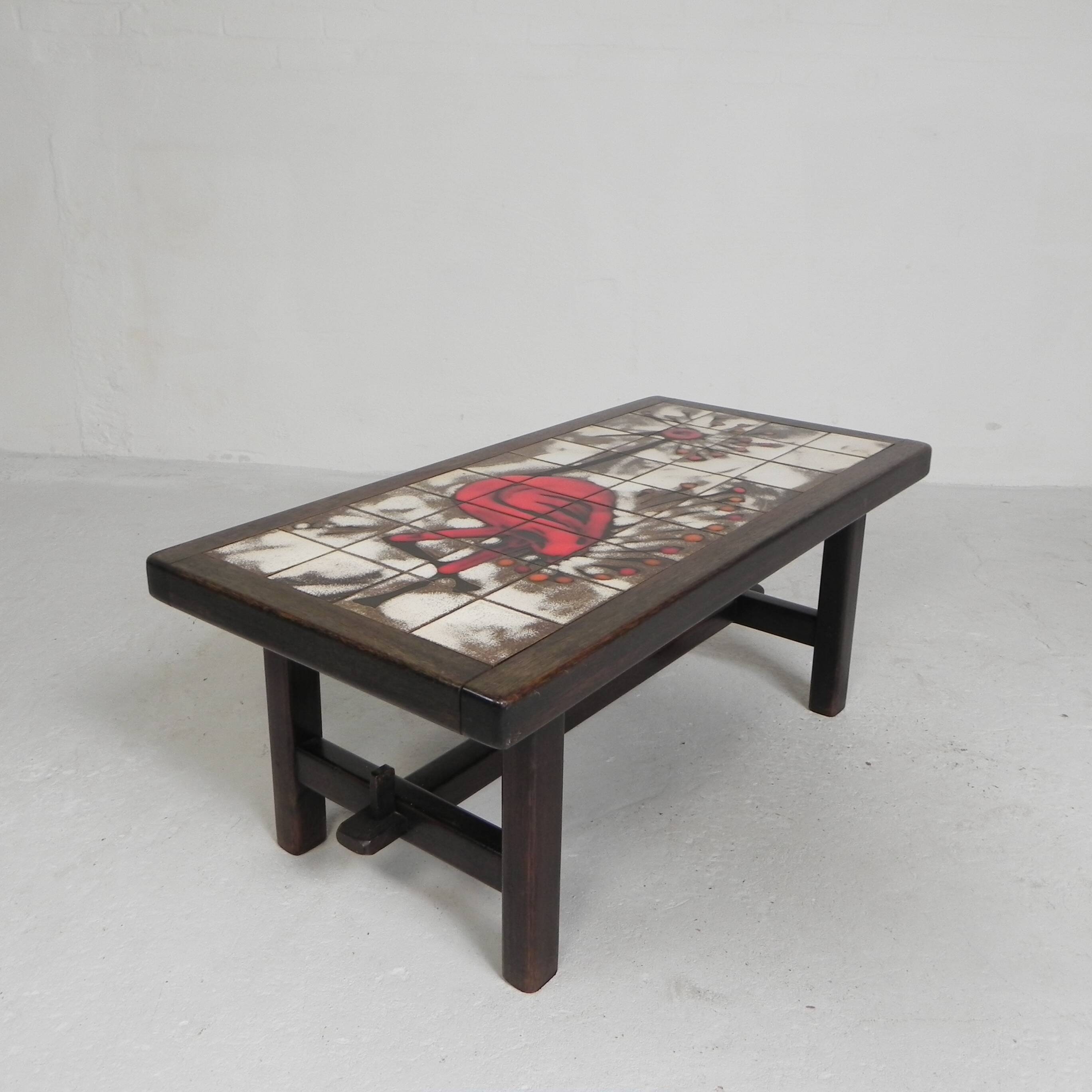 Square tile table from Vallauris, signed Dan with an image of a fantastic bird, 1960s.