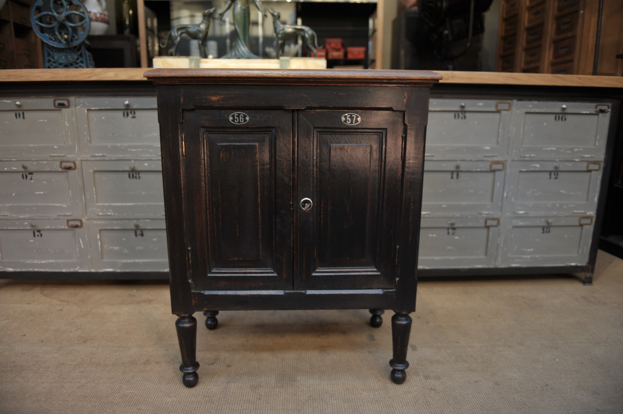 1930s Oak furniture with 2 black patinated doors.