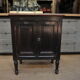 1930s Oak furniture with 2 black patinated doors.