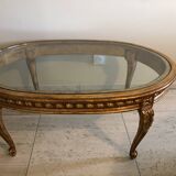 Table basse dessus en verre et tilleul doré vieilli