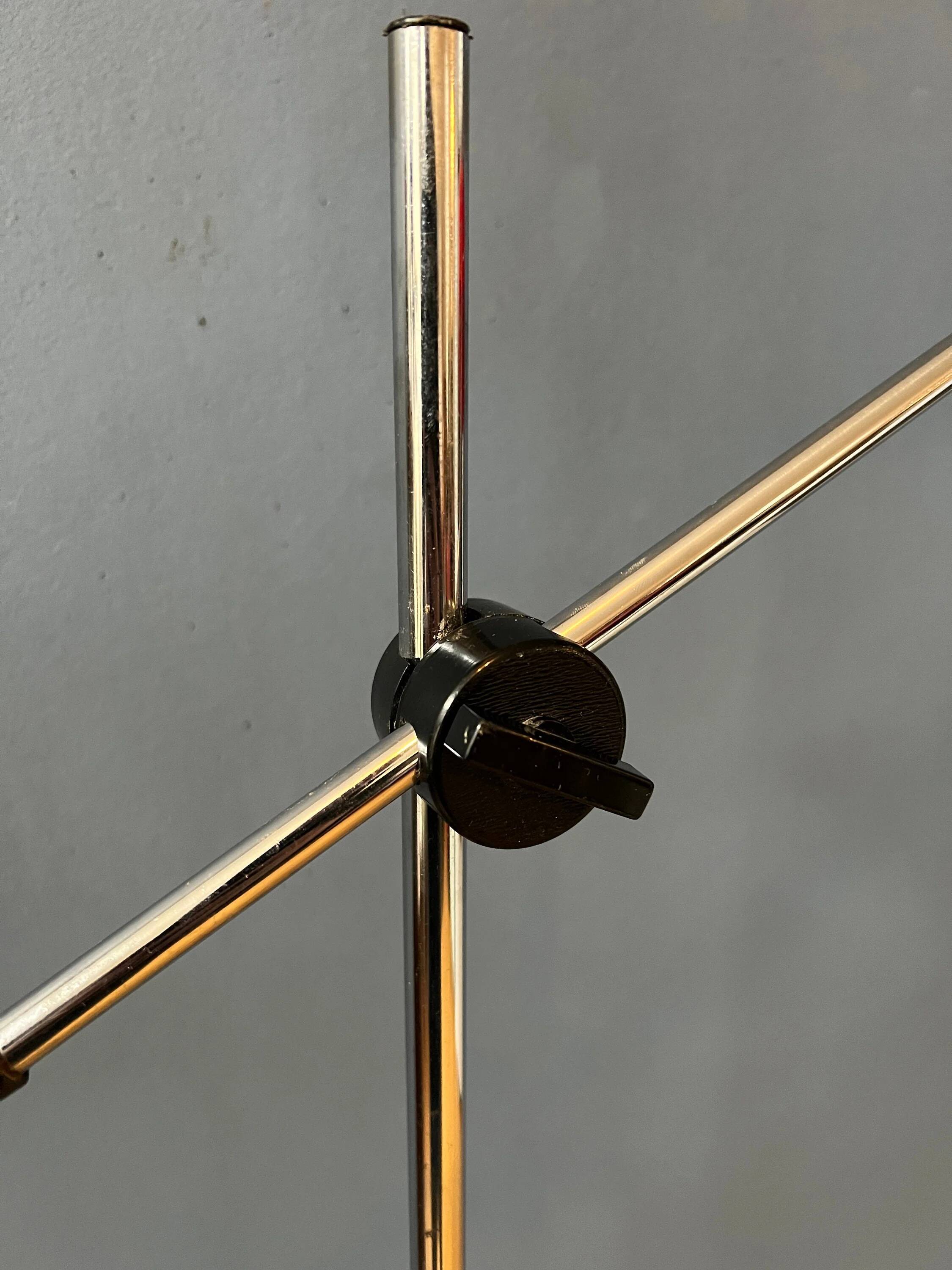 Adjustable red floor lamp in the style of Hoogervorst.